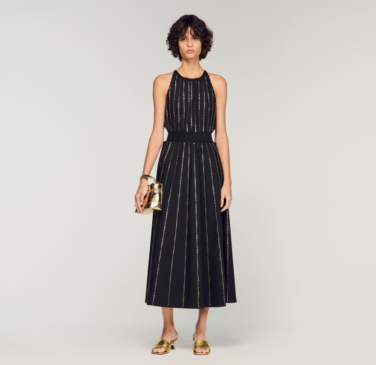 Жіноча чорна сукня, прикрашена стразами