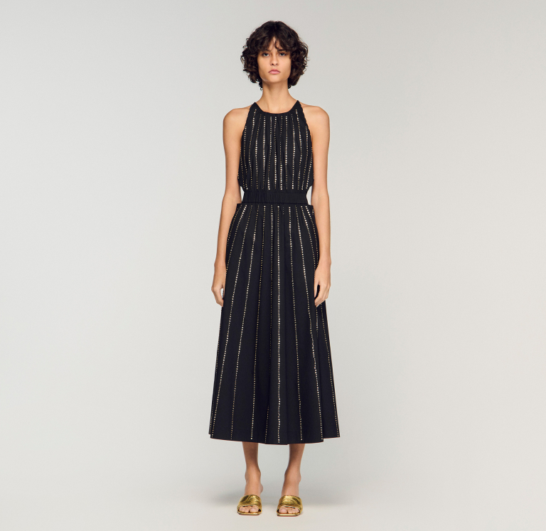 Жіноча чорна сукня, прикрашена стразами