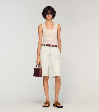 Жіночий молочний в'язаний боді