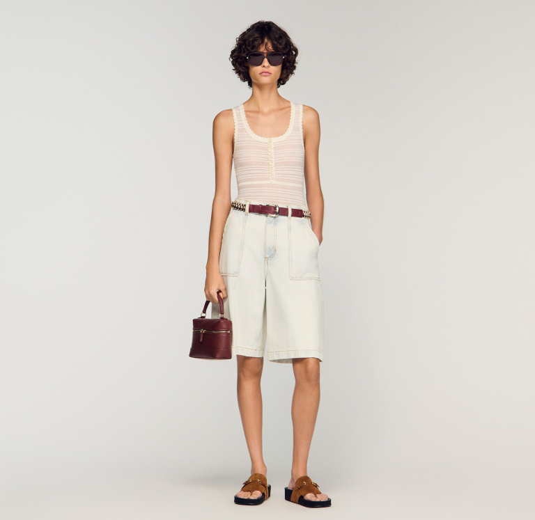 Жіночий молочний в'язаний боді