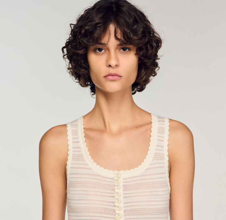 Жіночий молочний в'язаний боді