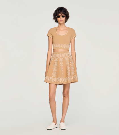 Жіноча бежева спідниця з вишивкою