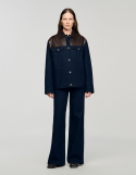 Женская джинсовая куртка с кожаными вставками