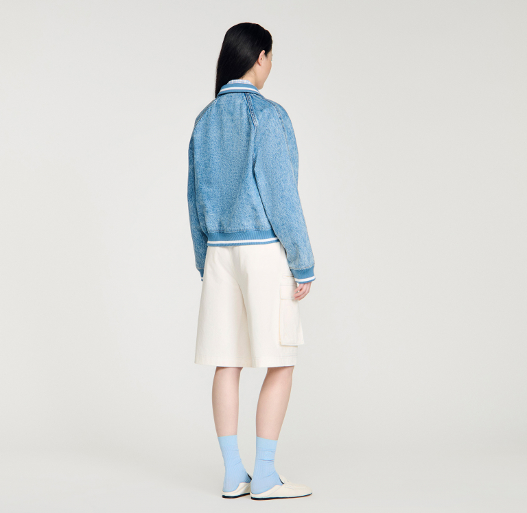 Жіноча джинсова куртка зі вставками