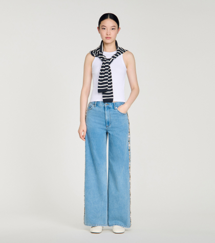 Жіночі широкі джинси з квітковим візерунком