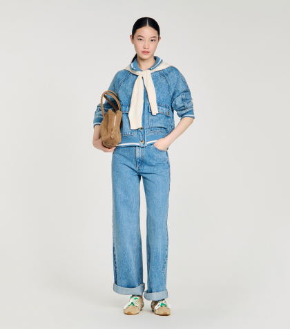 Жіночі широкі вицвілі джинси