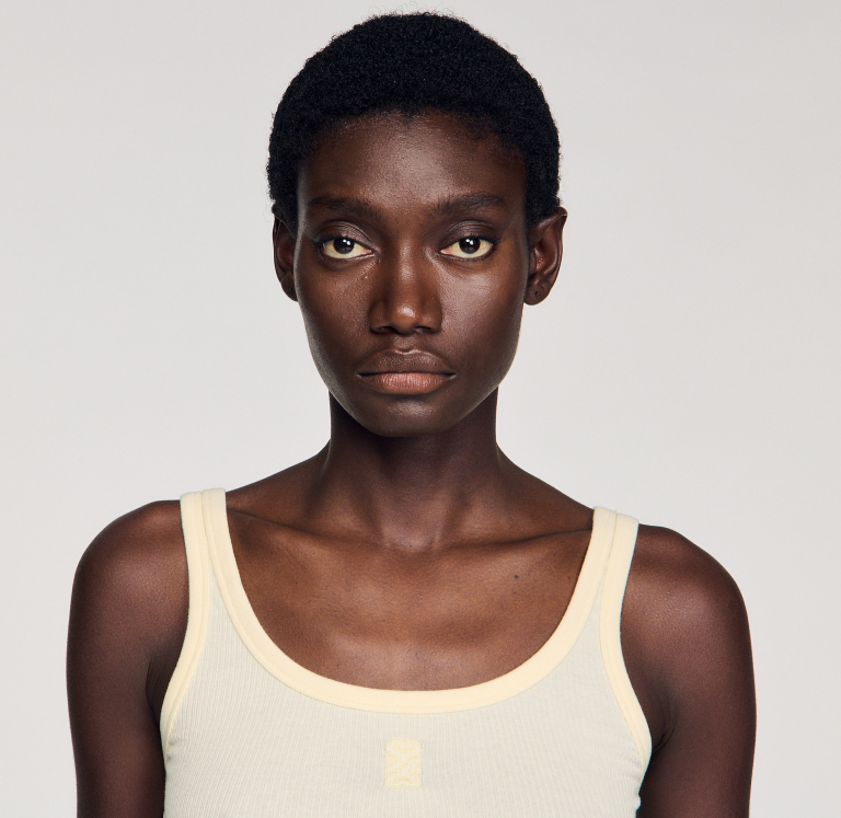 Жіночий жовтий топ в рубчик