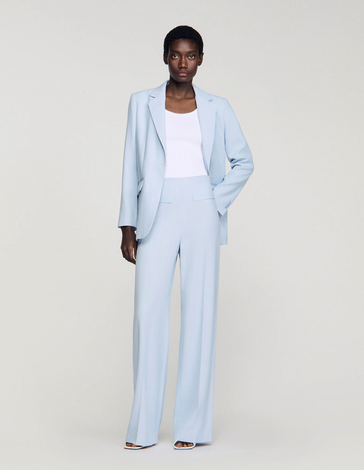 Женские брюки в вертикальную полоску с пайетками_1