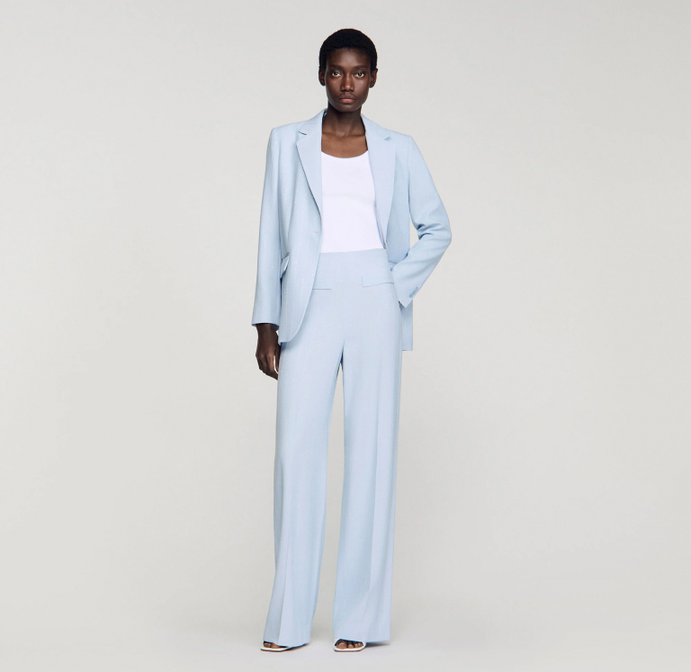 Женские брюки в вертикальную полоску с пайетками