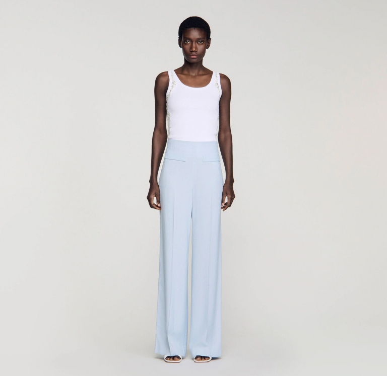 Женские брюки в вертикальную полоску с пайетками