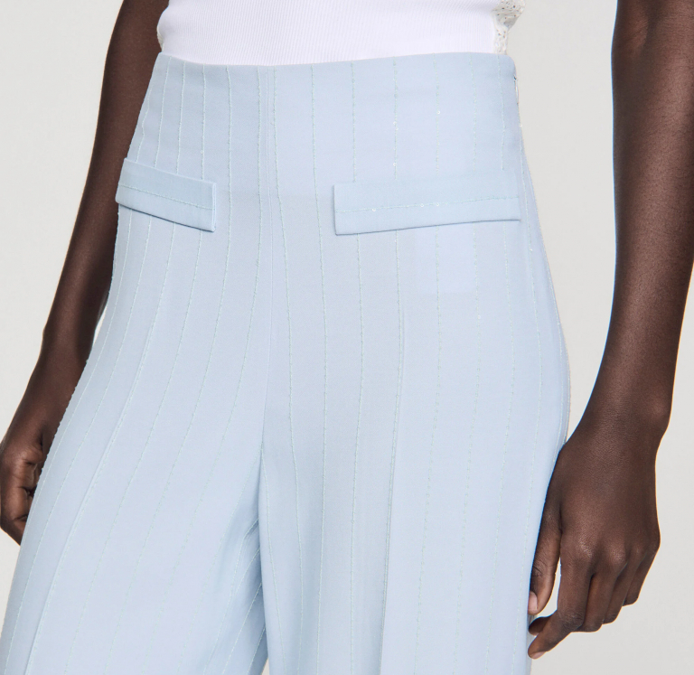 Женские брюки в вертикальную полоску с пайетками