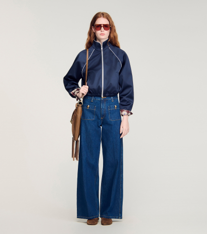 Жіночі широкі джинси з накладними кишенями