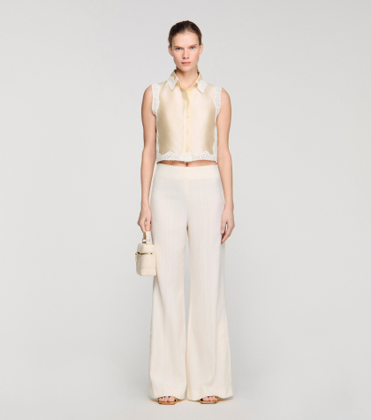 Женские брюки палаццо с разрезами на пуговицах