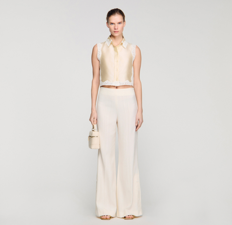 Женские брюки палаццо с разрезами на пуговицах