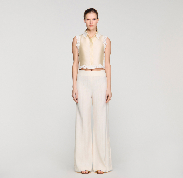 Женские брюки палаццо с разрезами на пуговицах