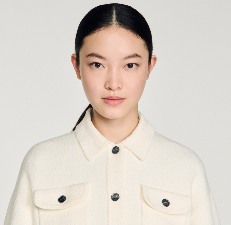 Жіночий молочний кардиган з джинсовими вставками