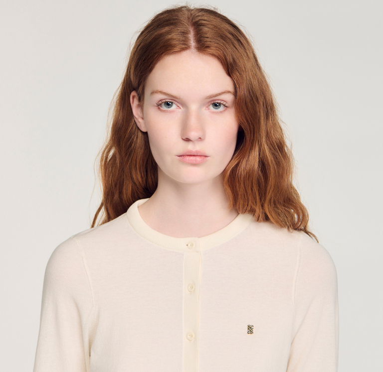 Жіночий молочний кардиган з логотипом