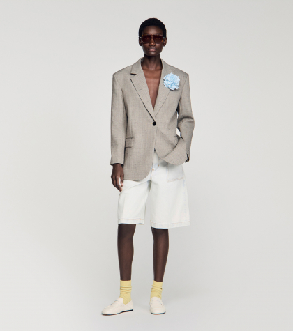 Жіночий сірий картатий жакет з брошкою