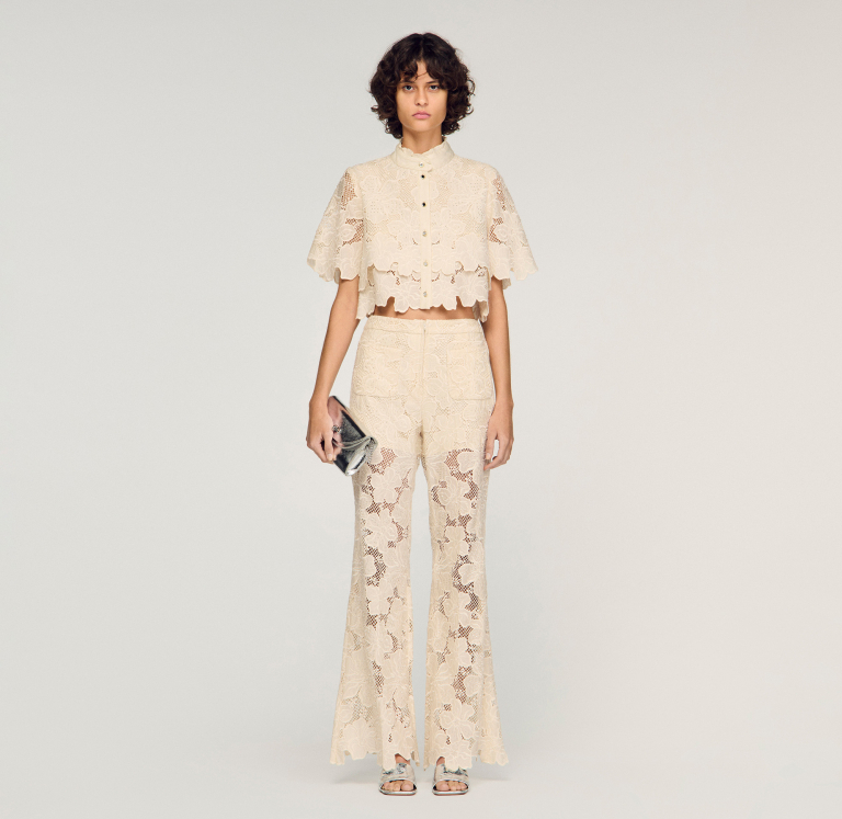 Жіночі молочні гіпюрові брюки