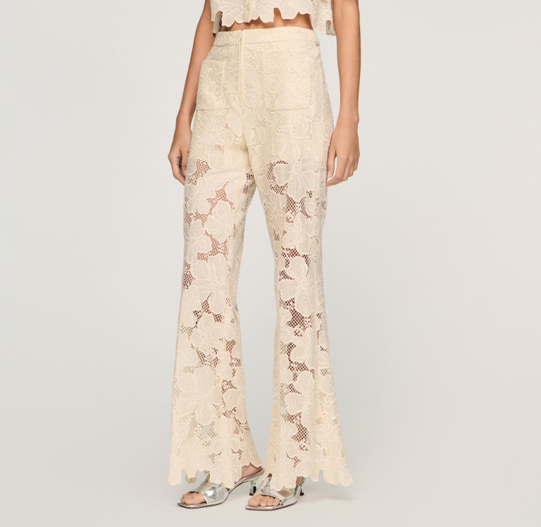 Жіночі молочні гіпюрові брюки