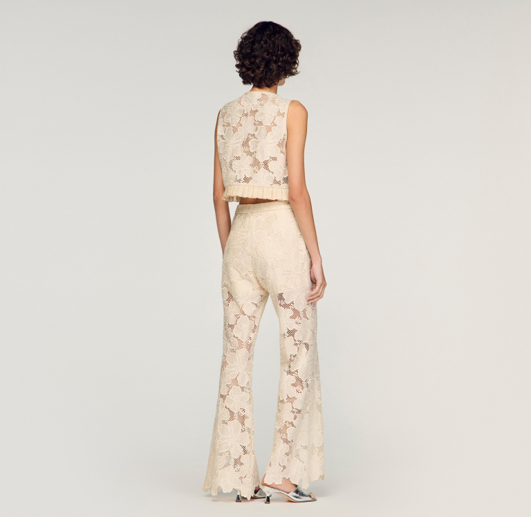 Жіночий топ із гіпюрового мережива з оборкою