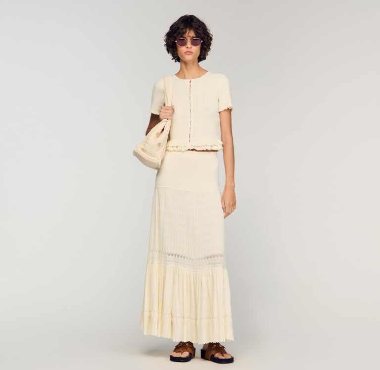 Женский вязаный кардиган с оборками