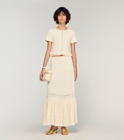 Жіноча молочна в'язана спідниця