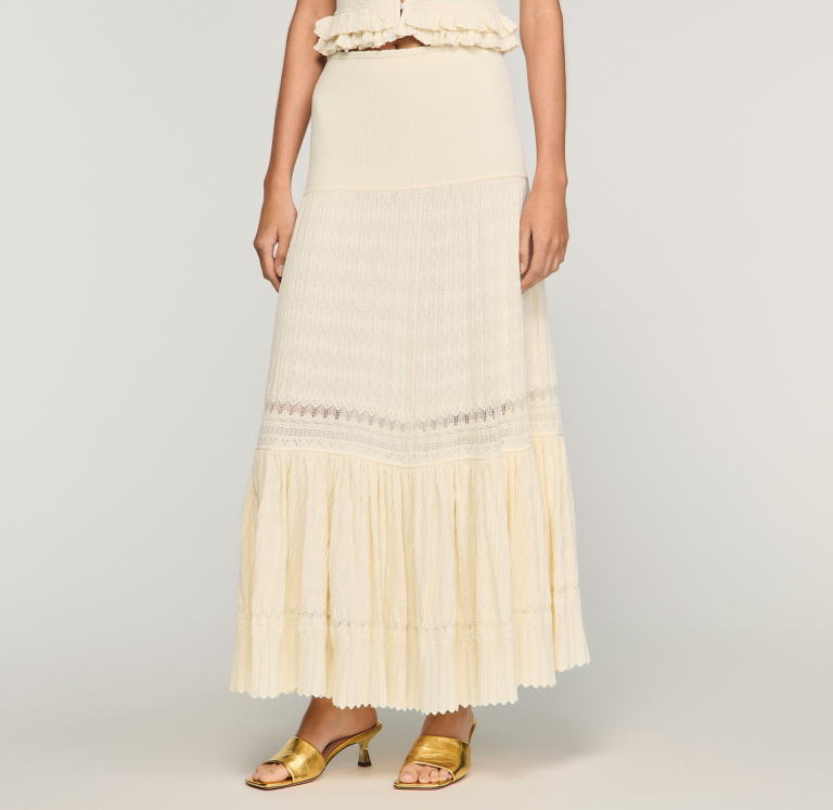 Жіноча молочна в'язана спідниця