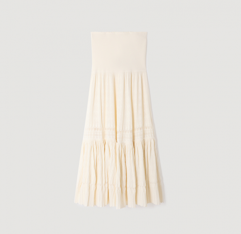 Жіноча молочна в'язана спідниця