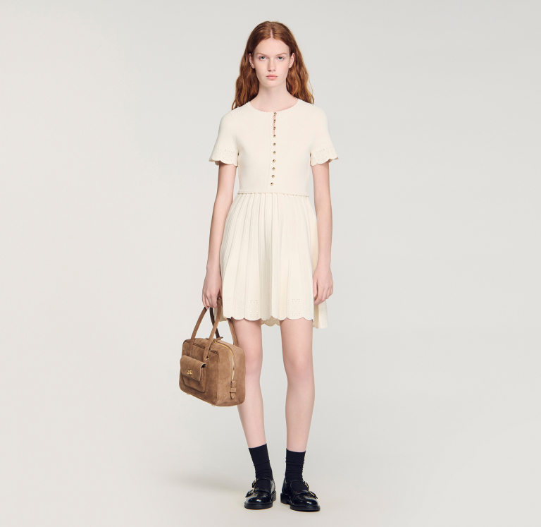 Жіноча в'язана сукня з ажурним візерунком