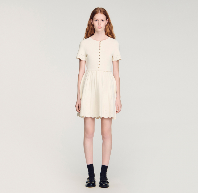 Жіноча в'язана сукня з ажурним візерунком