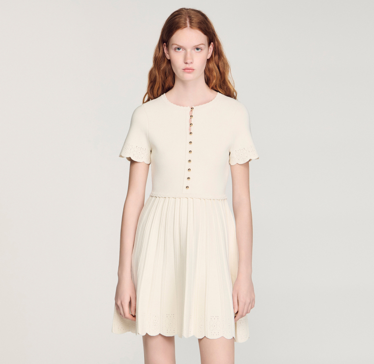 Жіноча в'язана сукня з ажурним візерунком