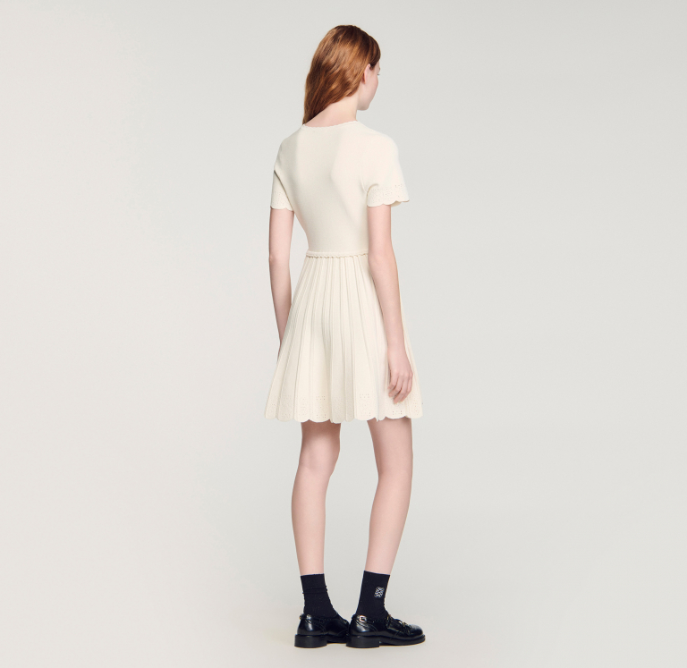 Жіноча в'язана сукня з ажурним візерунком