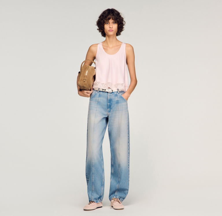 Женские джинсы-баллоны с эффектом потертости