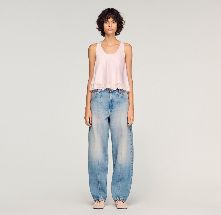 Женские джинсы-баллоны с эффектом потертости