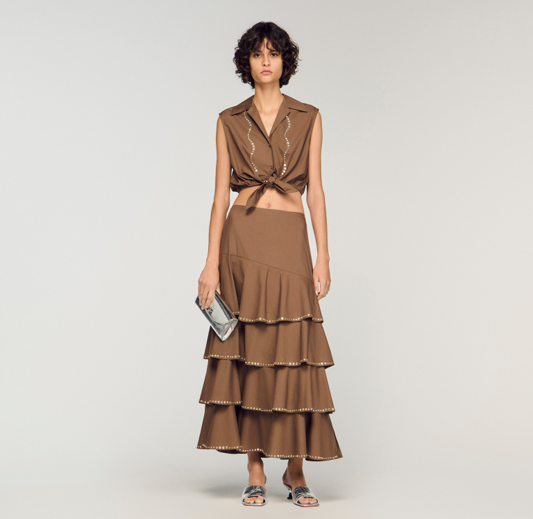 Жіноча довга спідниця, прикрашена стразами та оборками