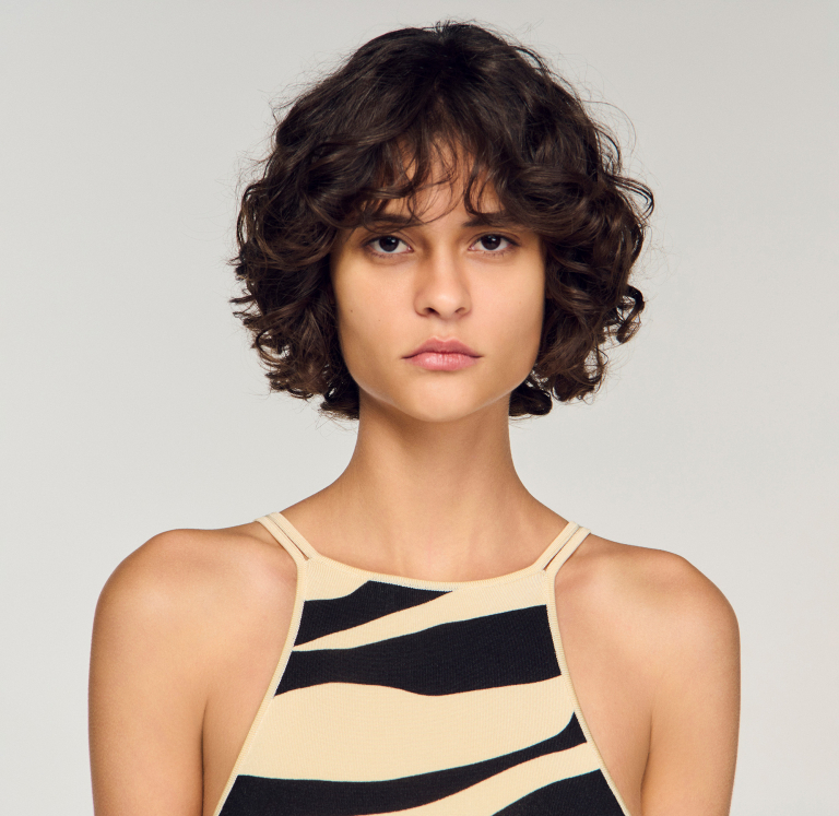 Жіноча в'язана сукня із зебровим принтом