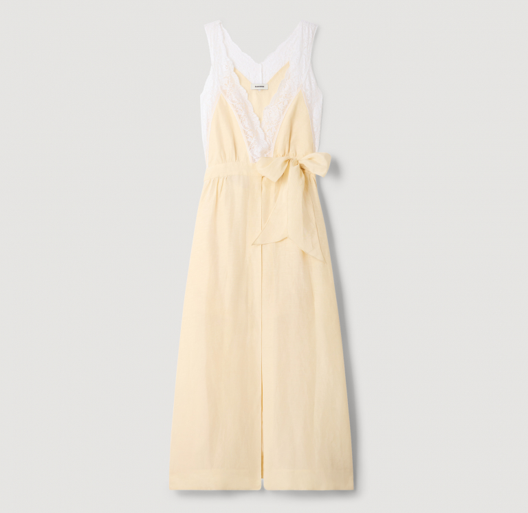 Жіноча молочна сукня з мереживним оздобленням