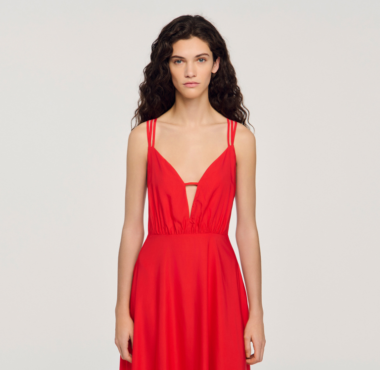 Жіноча червона сукня з асиметричним подолом