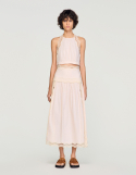 Жіноча рожева спідниця з мереживним оздобленням