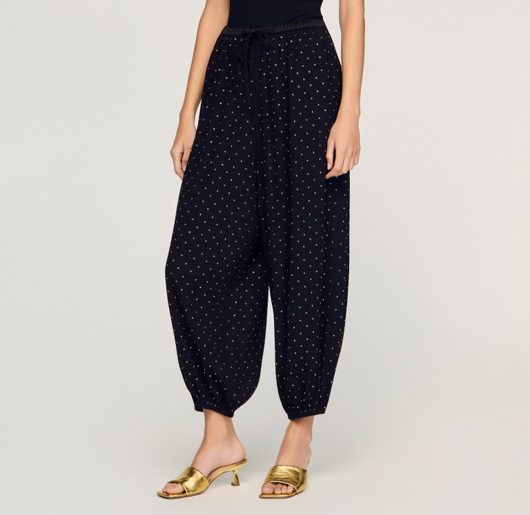 Жіночі широкі брюки, прикрашені стразами