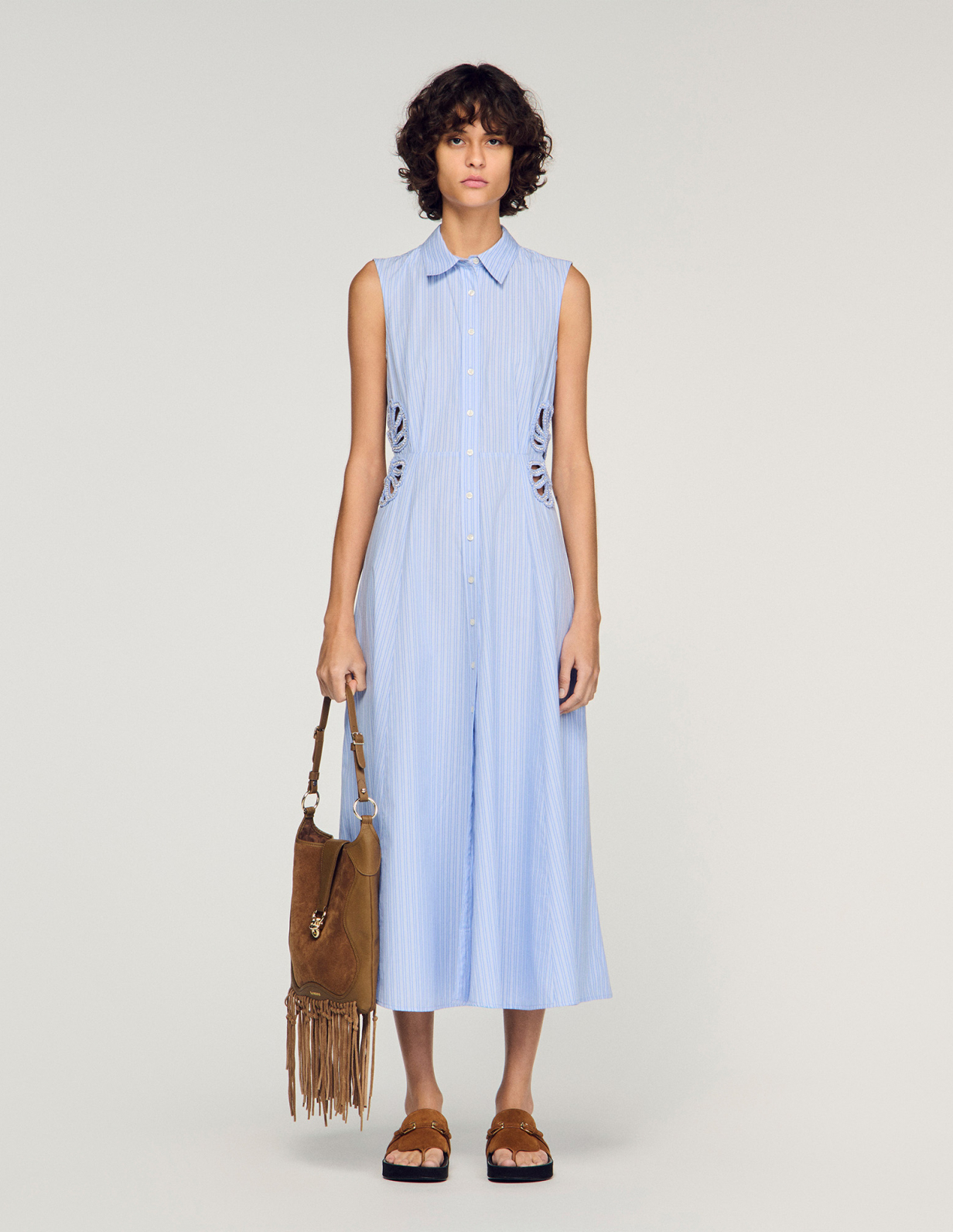 Жіноча смугаста сукня з вишитими деталями_1