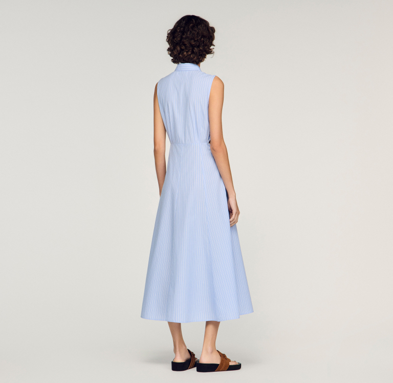 Жіноча смугаста сукня з вишитими деталями