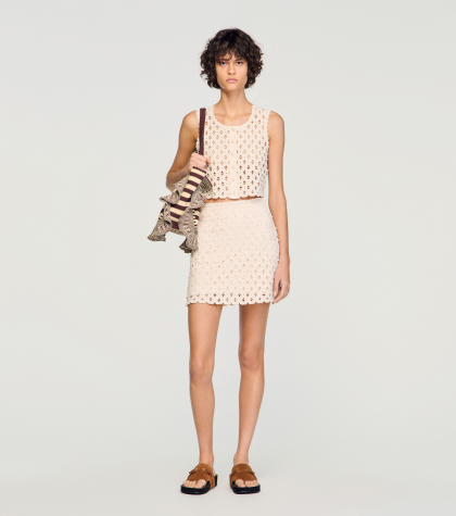 Жіноча молочна в'язана спідниця з бісером