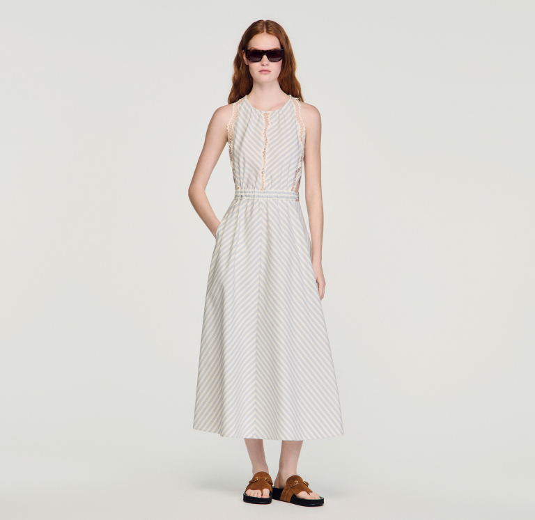 Жіноча смугаста сукня з мереживними деталями